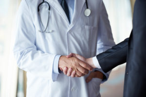 image-300x200 doctor handshake with a patient